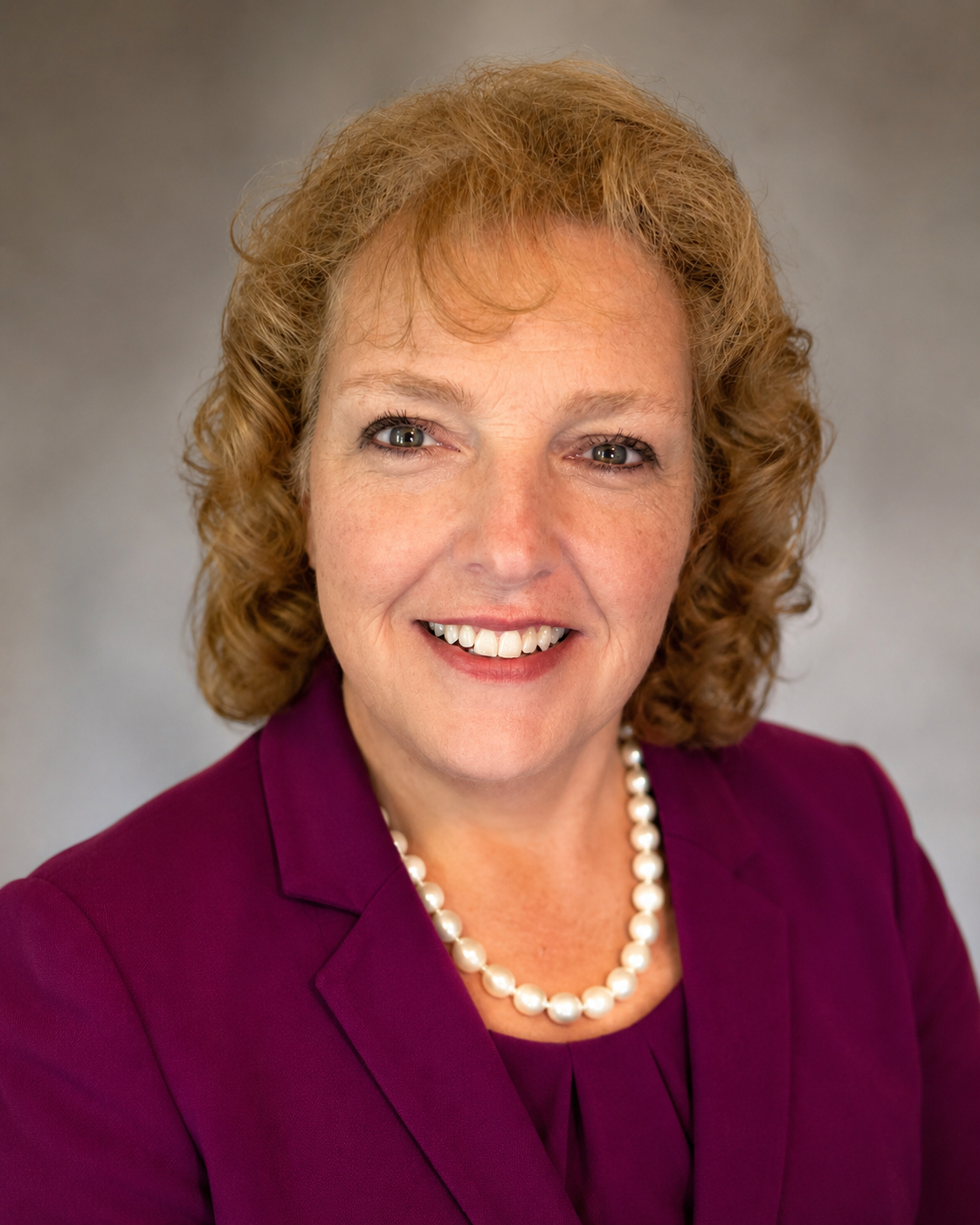 Professional portrait of Melynda Strouse, AI Marketing Consultant